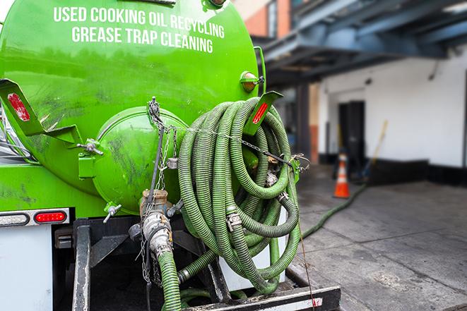 a service truck pumping grease from a restaurant's grease trap in Rowland Heights